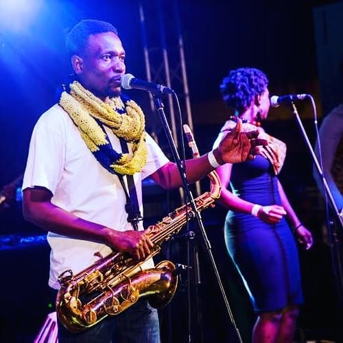 Juma Tutu performing live with saxophone and vocals